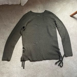 Green sweater with tie sides